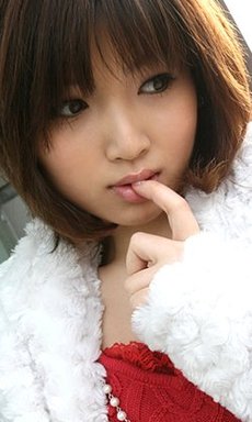 Asian babe Rinka shows her boobs